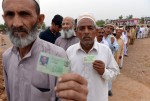 Over 30 dead as Pakistan braves Taliban to vote