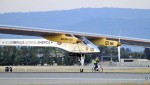A member of the Solar Impulse crew rides an electric bike alongside the plane as it takes off from Moffett Field NASA Ames Research Center in Mountain View, California on May 3, 2013. The first-ever manned airplane that can fly by day or night on the Sun's power alone took off Friday on the first leg of a trip across the United States. Solar Impulse, piloted by Swiss adventurer Bertrand Piccard, left the runway in northern California at 6:12 am (13:12 GMT) against the backdrop of a golden morning sunrise, in what a mission control operator called a "perfect takeoff."  AFP PHOTO/Josh Edelson