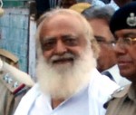 Spiritual guru Asaram Bapu being produced at court in Jodhpur on Sept. 1, 2013. (Photo: IANS)