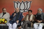 New Delhi: (L-R) Union Minister for Finance, Corporate Affairs, and Information and Broadcasting Arun Jaitley, BJP chief Amit Shah, social activist Kiran Bedi and Delhi in-charge of the party Prabhat Jha during a programme organised to welcome Bedi in BJP on Jan 15, 2015. (Photo: Amlan Paliwal/IANS)