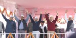 New Delhi: Aam Aadmi Party (AAP) leaders Sandeep Kumar, Satyendra Jain, Gopal Rai, Arvind Kejriwal, Manish Sisodia and Jitendra Singh Tomar during the swearing-in ceremony of Delhi Chief Minister Arvind Kejriwal at Ramlila Maidan in New Delhi, on Feb 14, 2015. (Photo: Amlan Paliwal/IANS)