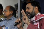 New Delhi: Dissident AAP leaders Yogendra Yadav and Prashant Bhushan during a press conference in New Delhi, on April 15, 2015. (Photo: IANS)